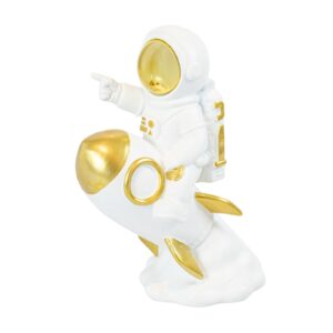 Escultura em Resina Astronauta Sentado no Foguete com Dourado